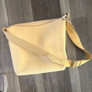 Rothy's Stylish Yellow mini zip bucket crossbody